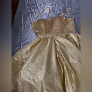NEW AND NEVER WORN gold bridal dress or quince court dress with tags. Size Small